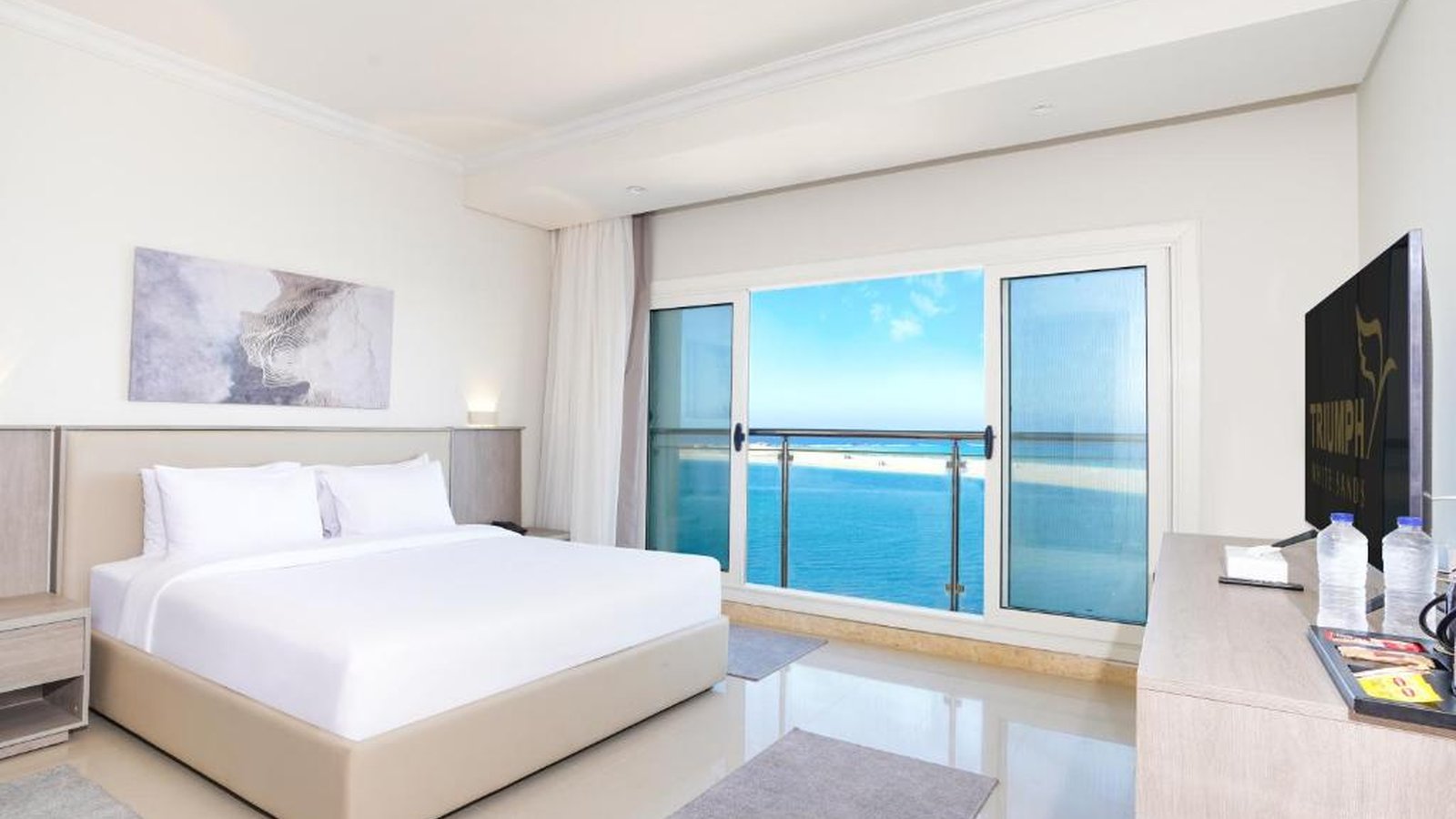 Triumph white sands Hotel